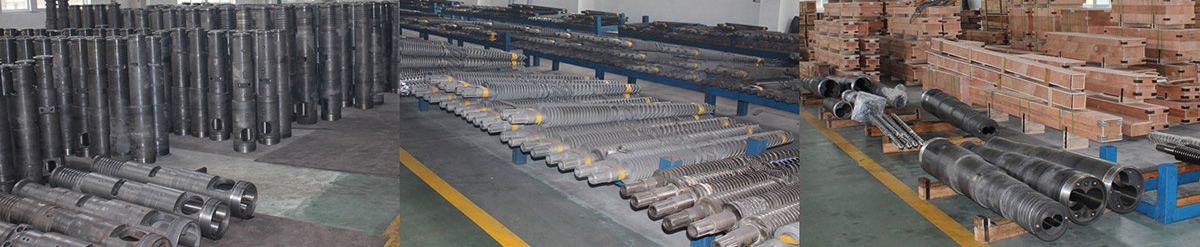 Extruder screws and barrels stored in factory warehouse after bimetallic lining casting