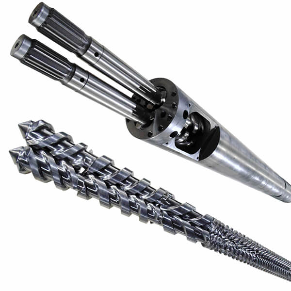 Figure 1. A parallel twin screw and barrel assembly used in plastic extrusion applications.