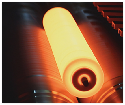 Centrifugal casting of the bimetallic liner — the wear protection is metallurgically fused to the steel shell, not coated onto it